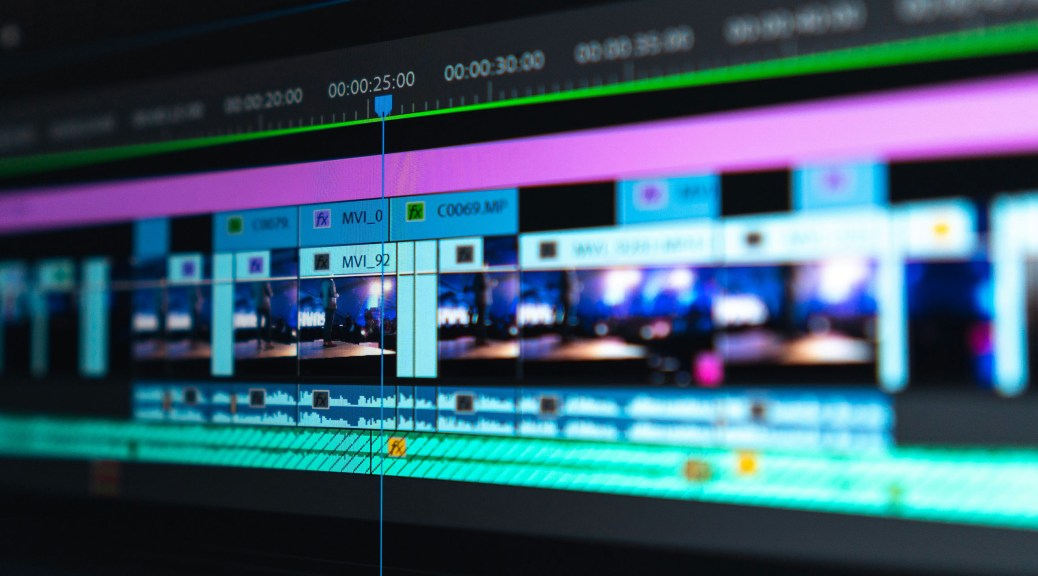 Taster videos | Photo shows video editing software on an ultra-widescreen monitor
